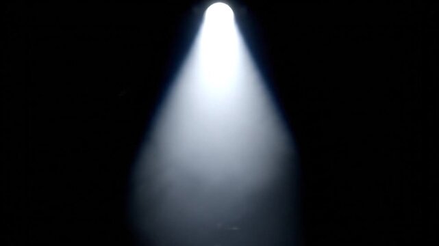 Bright beam of light piercing darkness
