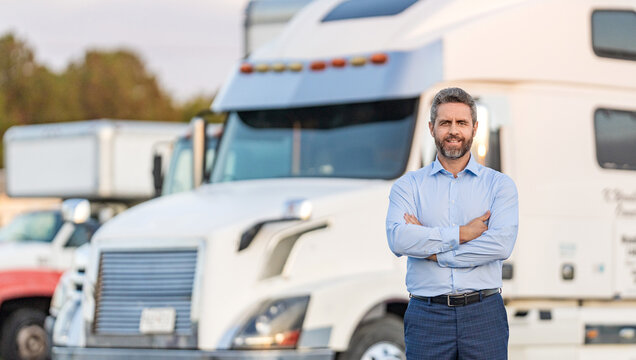 Businessman truck owner banner. Hispanic driver in front of truck. Trucking owner. Truck driver. Man trucker driver near lorry truck. Transportation vehicle. Semi trucks vehicle. Hispanic man trucker