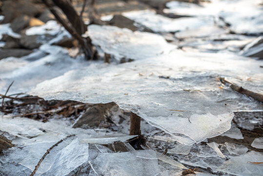Cracked Ice Sheets on Rocky Surface