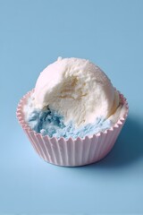 blue and white vanilla ice cream in a cup