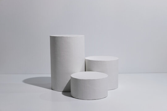 Three Cylinder podium or empty pedestal display on white background