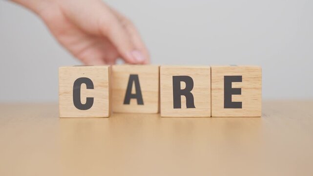 hand change wooden block Cure to Care. Heal, Treatment, Therapy, Nursing, wellness and healthcare concepts
