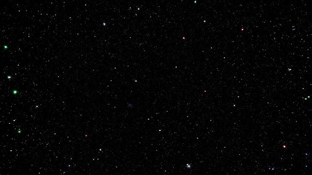 A vast expanse of deep black space speckled with countless bright, tiny stars and faint nebulae