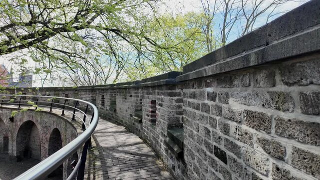 The Burcht van Leiden, an 11th-century shell-shaped citadel perched atop a nine-meter-tall artificial hill, offering panoramic views of the historic Dutch city. Ideal for travel guides