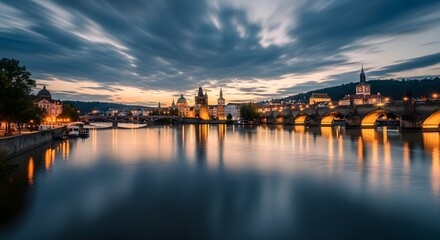 Fototapeta premium Historic European riverside city during blue hour