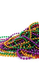 A brightly colored assortment of shiny Mardi Gras style plastic party beads piled high against a crisp, isolated white background, colorful, white, carnival