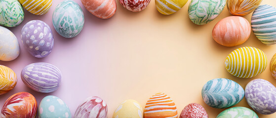 Brightly painted Easter eggs are arranged in a circle on a soft pastel backdrop. The center space is empty for adding text or decorations during Easter