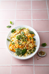Warm salad with couscous and pumpkin