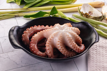 Gourmet boiled octopus in the plate © Andrei Starostin