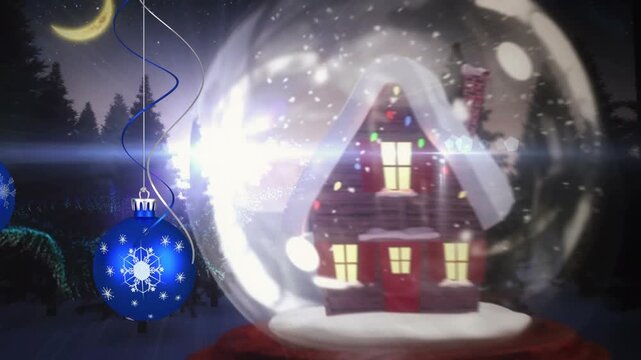Animation of merry christmas text over snowglobe and decorations on winter background