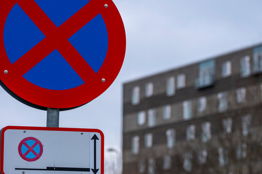 Closeup sign shows parking prohibition symbol with urban street traffic regulation and restriction for clear mobility communication and safety
