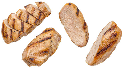 slices and pieces of grilled chicken breast, seasoned with pepper and grill marks, presented against a transparent background, suitable for culinary and advertising use. © Theresa