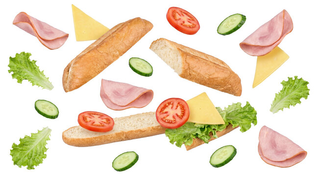 scattered sub sandwich ingredients on a dark background: baguette pieces, ham slices, cheese squares, lettuce, cucumber, and tomato, creating a dynamic food composition.