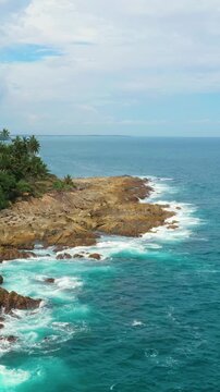 Drone Footage Of Rugged Oceanfront Rocks And Crashing Waves