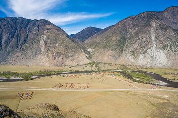 Aerial view of Chulyshman valley in Altai Russia surrounded by majestic mountains and wild nature Vast untouched landscape of Siberian wilderness