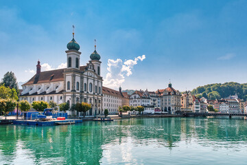 Lucerne, a compact Swiss city known for its well-preserved medieval architecture, is located amidst the snow-capped mountains of Lake Lucerne.