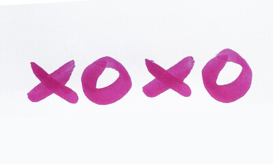 xoxo, hugs and kisses written on a white sheet.