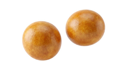 Fototapeta premium Two round golden colored objects with visible texture are presented against a plain white surface alpha channel with white background