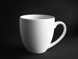 Obraz premium White ceramic cup isolated on black background. Minimalist design.