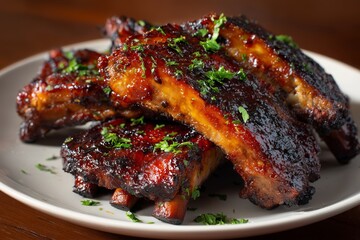 Juicy barbecue ribs with rich glaze and fresh herbs on a plate