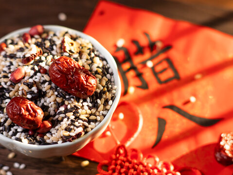 Drinking Laba porridge on the traditional Chinese festival of Laba.Chinese texts are "腊八&rdquo;&ldquo;福&rdquo;