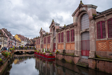Colmar canal flowing past Old Town historic buildings