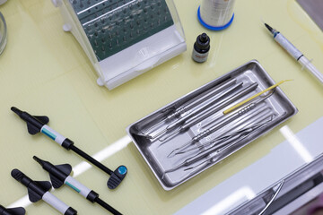 Dentist's instruments on a table. Materials and necessary equipment in a dental clinic. Dentist's...