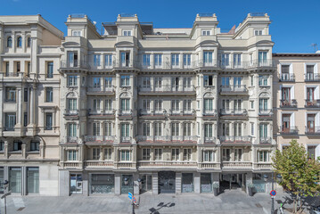 Image of a Madrid Neo-Mudéjar style facade, with horseshoe arches and elaborate ornamental exposed brickwork.