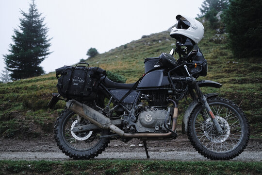 HUNEDOARA, ROMANIA - SEPTEMBER 12, 2025: Motorcyclist riding on a mountain offroad in autumn in parang Mountains, Romania.