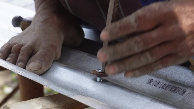 Hands Twisting Screwdriver Closeup