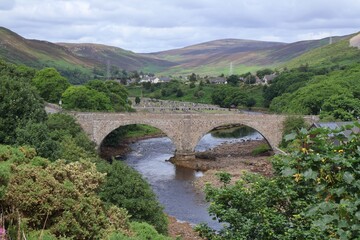 Helmsdale Bridge, a two-arch stone bridge spanning the River Helmsdale in the village of Helmsdale, Scotland
