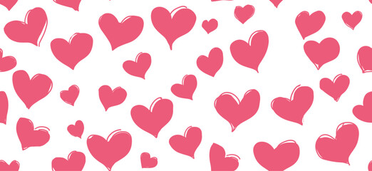Pink hand-drawn hearts forming a seamless pattern on a white background. Pink heart pattern creating simple love background