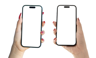 Two smartphones held in hands with blank screens isolated on transparent background for app mockup use.