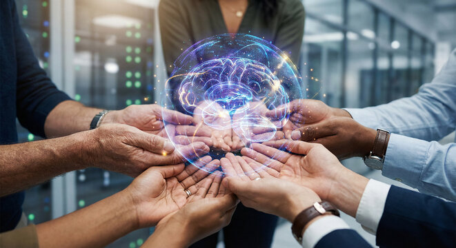 Diverse hands holding a glowing digital brain hologram, symbolizing AI, teamwork, and collective intelligence in a modern tech environment.