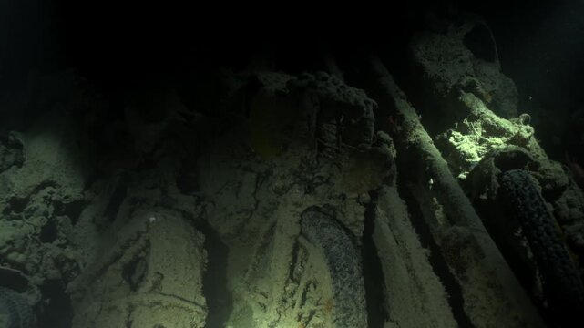 This image inside the SS Thistlegorm shows the specialized way its World War II cargo was transported. In the shadowed holds, BSA M20 and Norton 16H motorcycles seen loaded into the trucks.