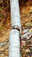 A concrete pole fell and broke. Humid tropics conditions and concrete structures