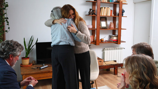 Family members hugging showing support and comfort