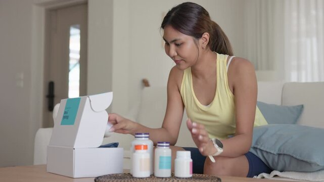 Young asia people woman buy custom tailor made anti aging pill bottle diet immune plan online health care shop open gift box weight loss herbal. Unbox order store clinic home service life balance.