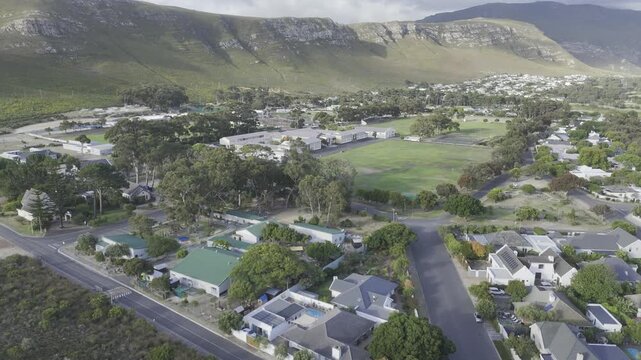 Drone flies over area north of Hoy's Koppie in the late afternoon along the Garden Route on a sunny day in Hermanus, South Africa