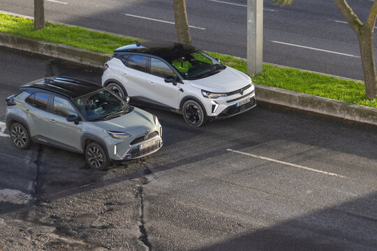 Toyota yaris cross and renault captur compact suvs parked