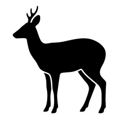 Fototapeta premium A silhouette of a deer standing in a natural environment viewed from the side