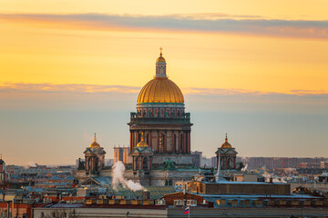 Fototapeta premium View of St. Isaac's Cathedrals from the Duma Tower. Beautiful sunset.