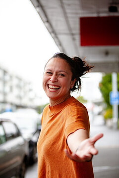 Confident Maori woman on an urban Auckland street
