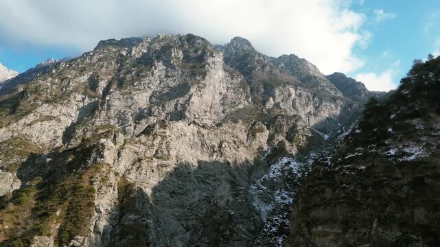 Aerial drone footage over the Susaibes stream near Andreis, Italy: clear water, rocky bed and pristine alpine surroundings. Ideal for nature, travel and scenic stock footage.
