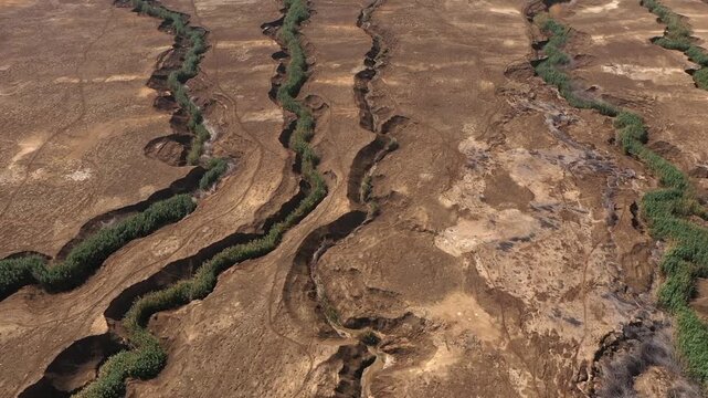 Aerial Dead Sea River Channels Erosion Landscape

Aerial drone footage of Dead Sea river channels and erosion patterns 1.1.2026 Israel
