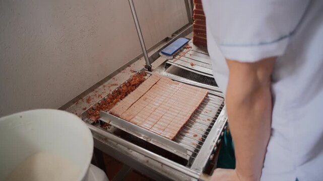 Man cutting bocadillo traditional sweet colombia