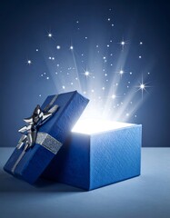 Fototapeta premium A shimmering blue gift box opens to reveal glowing light and sparkling stars inside