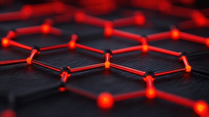 A close-up view of a geometric pattern featuring red and black elements, resembling a network or molecular structure with glowing connections.