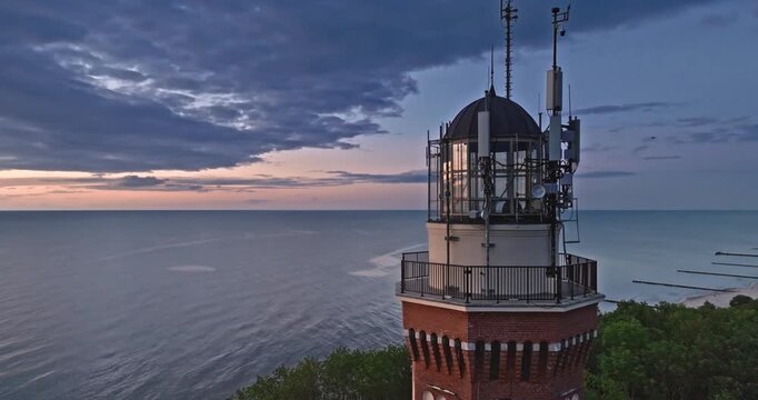 Beautiful Rewal Lighthouse at Sunset in Poland.