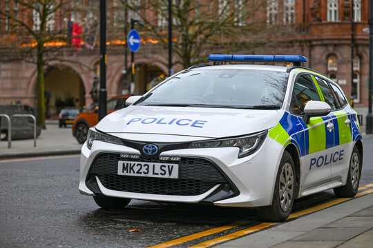 Greater Manchester Police emergency response cars parked outside Manchester town hall in the city centre. 